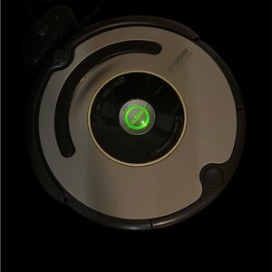 iRobot Roomba robot vacuum
 Roomba Vacuum Cleaner - Black and Silver